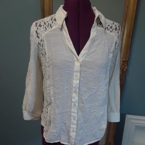 Off white button up blouse with lace inlays